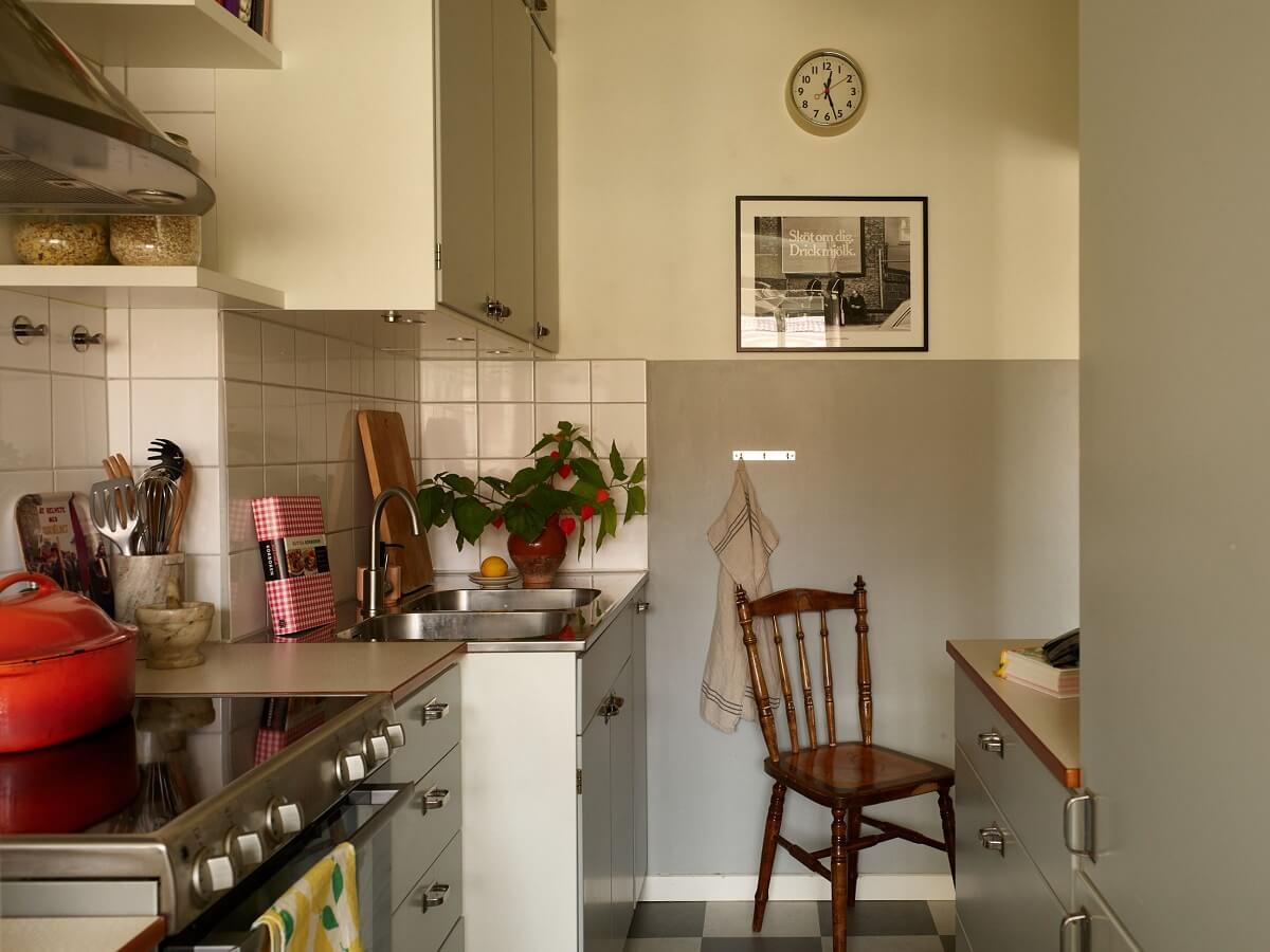 A Small 1930s Swedish Apartment with a Yellow Floral Hall 9 gray midcentury kitchen