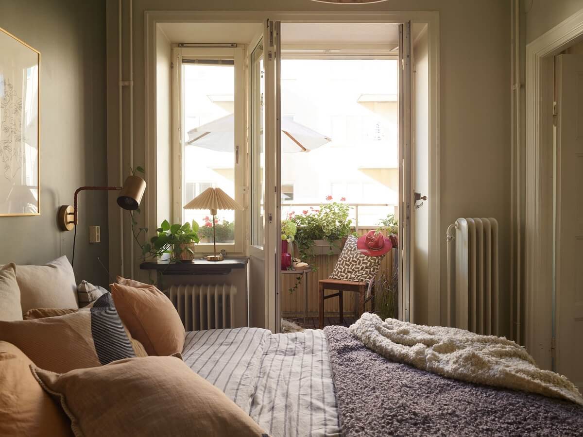 A Lovely Apartment Owned By The Same Family for Almost 100 Years 15 gray walls bedroom midcentury apartment