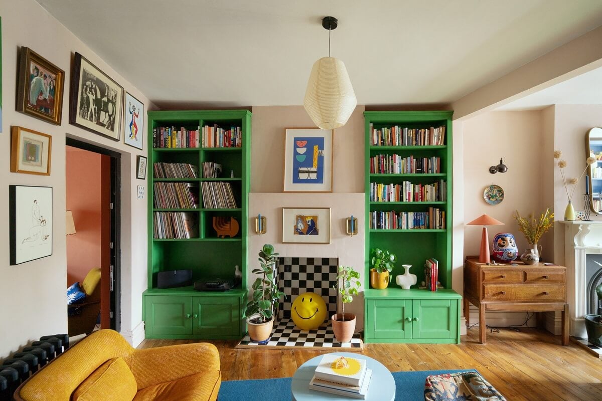 Colorful Rooms and Period Features in a London Terrace House 5 green bookshelves colorful living room