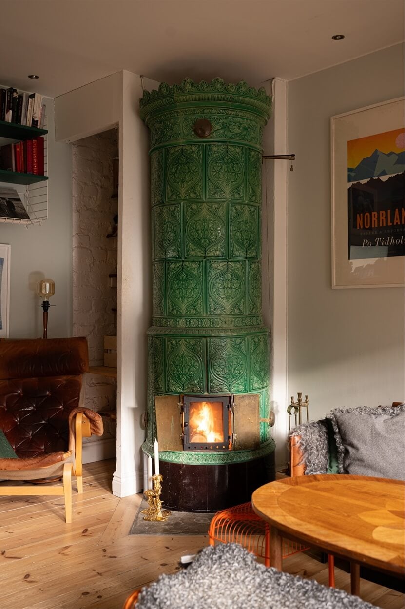 Green Tones in a Turn-of-the-Century Stockholm Apartment 9 green fireplace