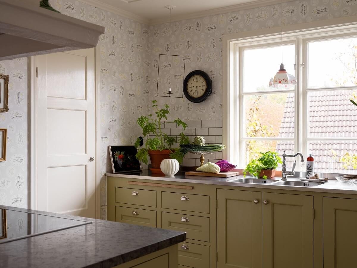 A 1930s Green-Painted Wooden Family Home in Sweden 2 green kitchen cupboards