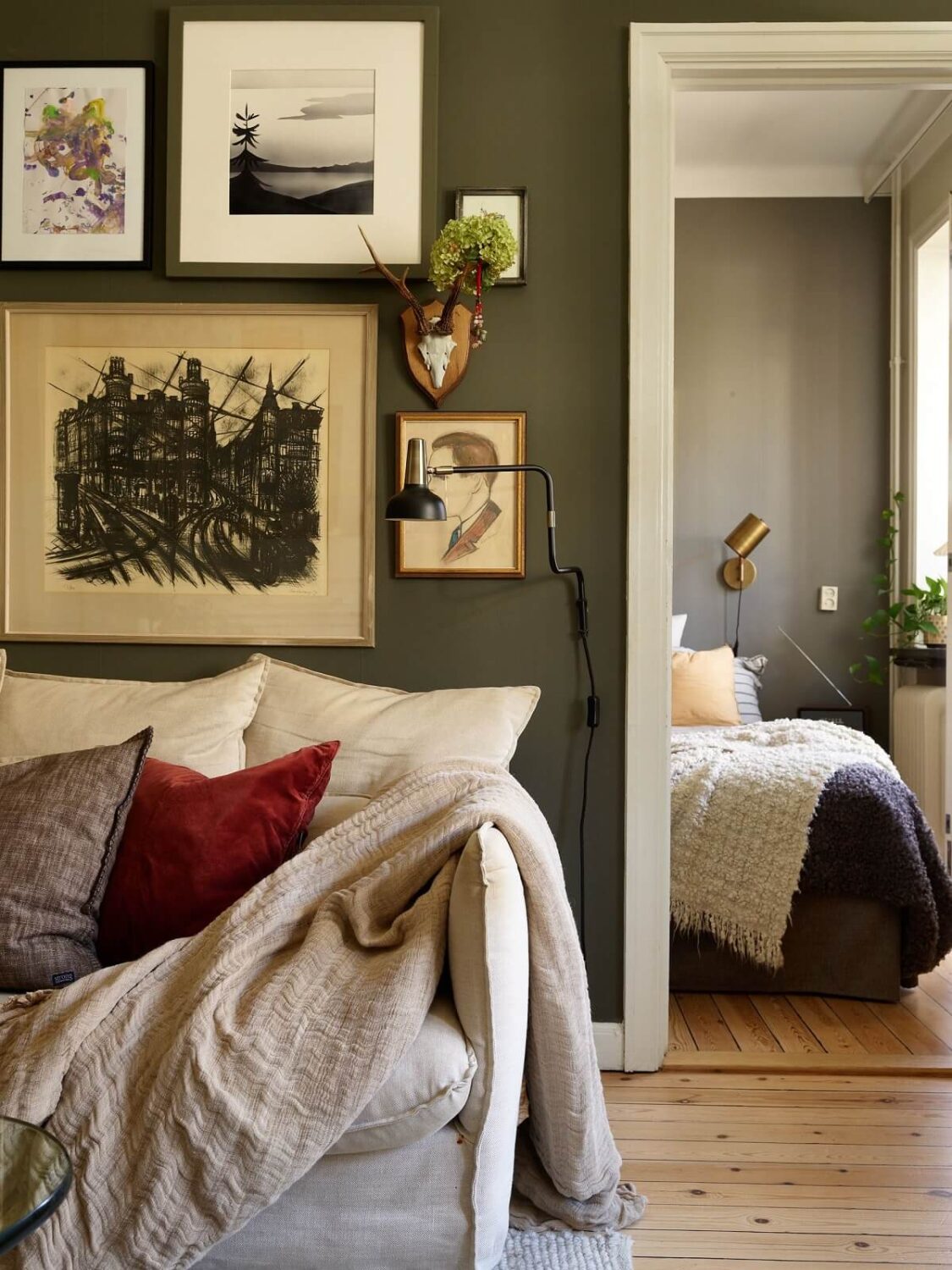 A Lovely Apartment Owned By The Same Family for Almost 100 Years 7 green wall living room