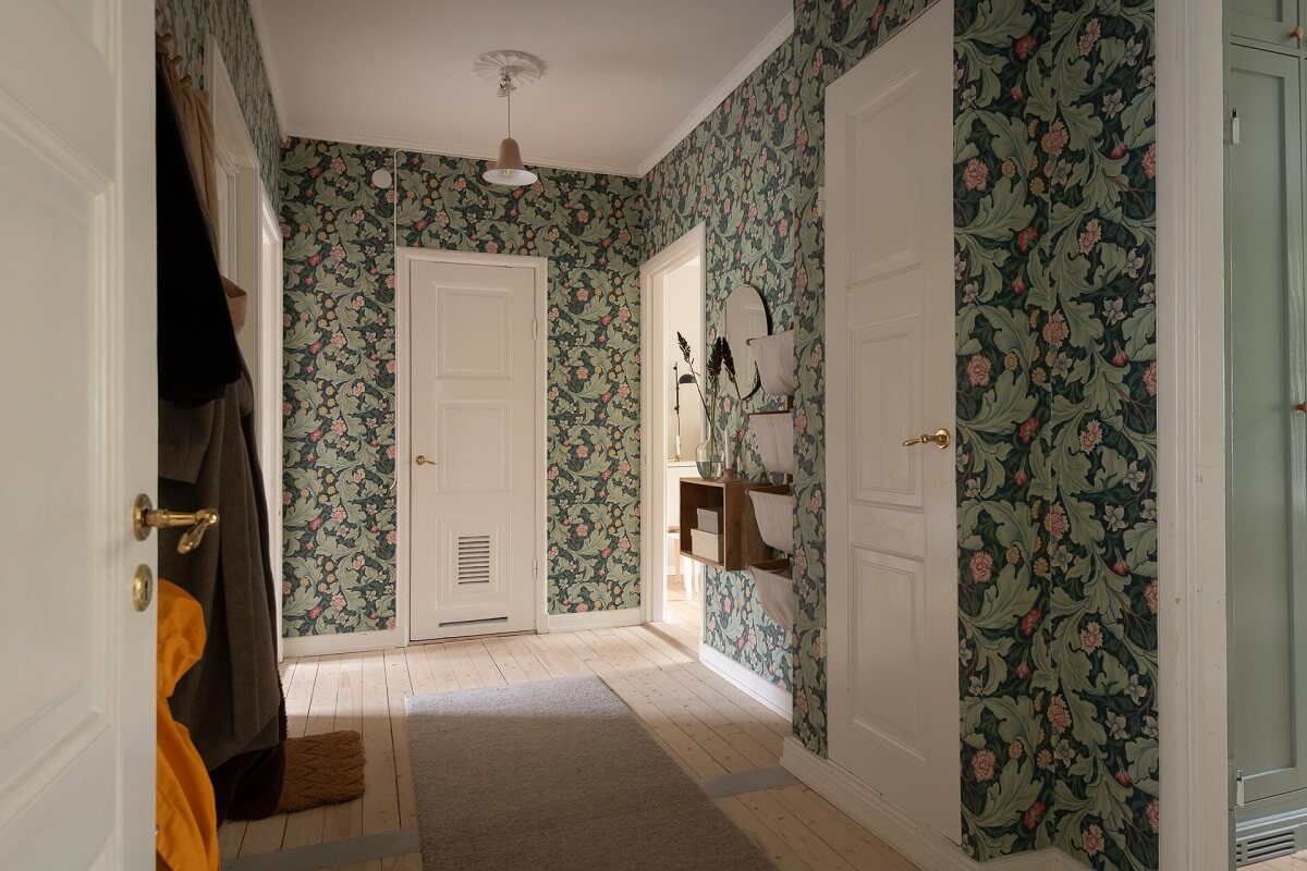 A Swedish Apartment Painted in Calm Beige, Green, and Pink Tones 27 hall green wallpaper