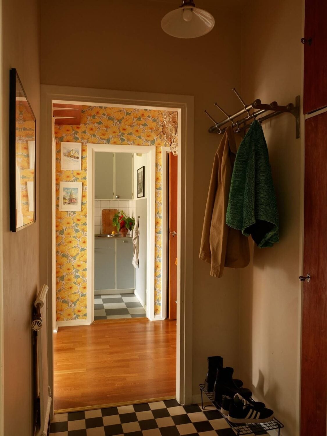 A Small 1930s Swedish Apartment with a Yellow Floral Hall 15 hall with checkerboard floor