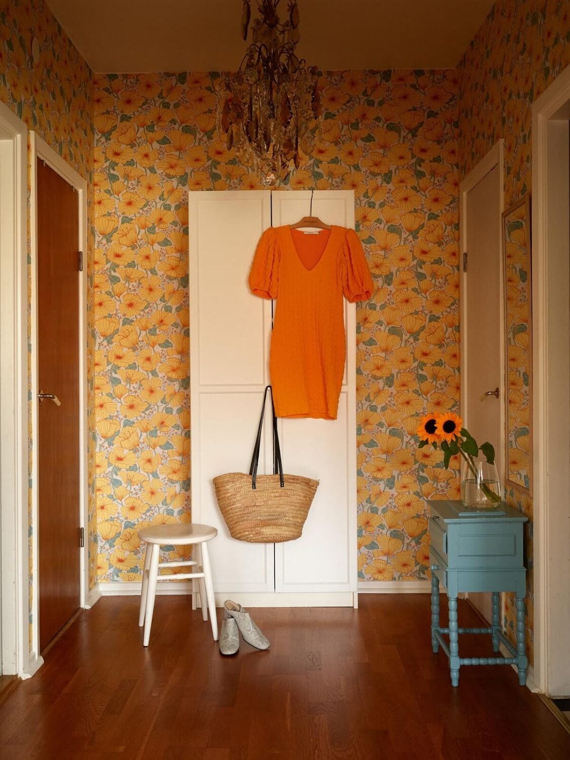 A Small 1930s Swedish Apartment with a Yellow Floral Hall 13 hall with floral wallpaper