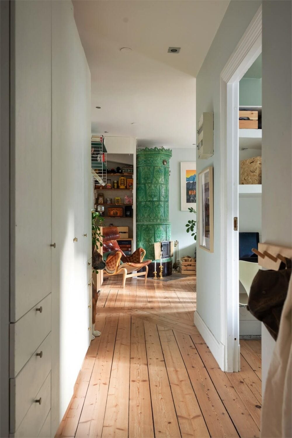 Green Tones in a Turn-of-the-Century Stockholm Apartment 12 hallway built in wardrobes wooden floor