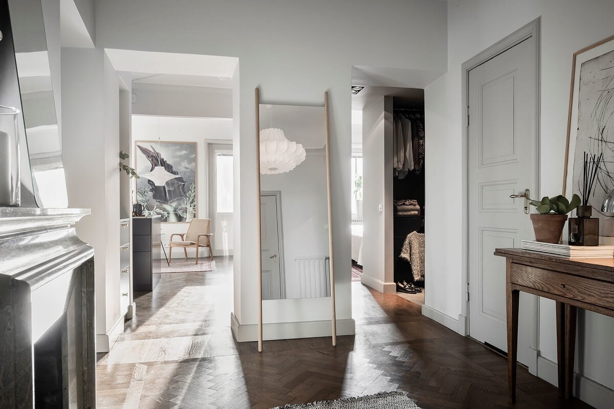 A Burgundy Kitchen in a Stylish Scandinavian Apartment 28 hallway floor mirror fireplace A Burgundy Kitchen in a Stylish Scandinavian Apartment
