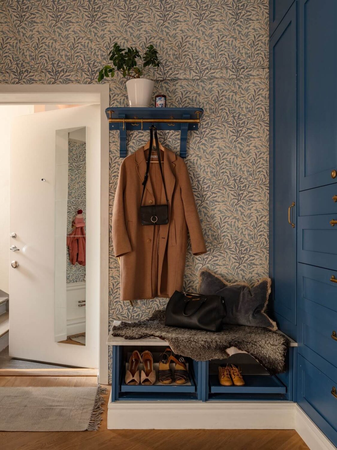 Best of 2025: Hallways 28 hallway with wallpaper and blue cabinets and shoe storage with bench nordroom