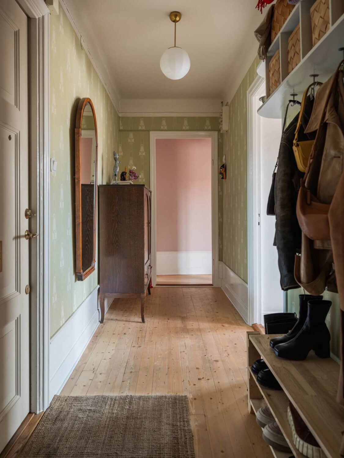A Living Room with Light Purple Walls in a Swedish Apartment 17 hallway with wallpaper and storage A Living Room with Light Purple Walls in a Swedish Apartment