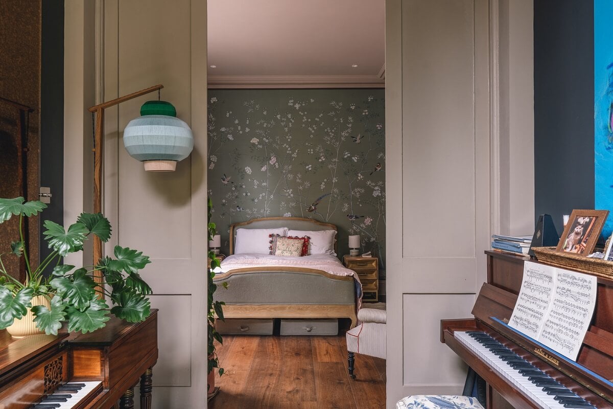 A Grand Ground Floor Apartment with Dark Blue Walls and a Garden 11 hidden doors to bedroom with floral wallpaper nordroom