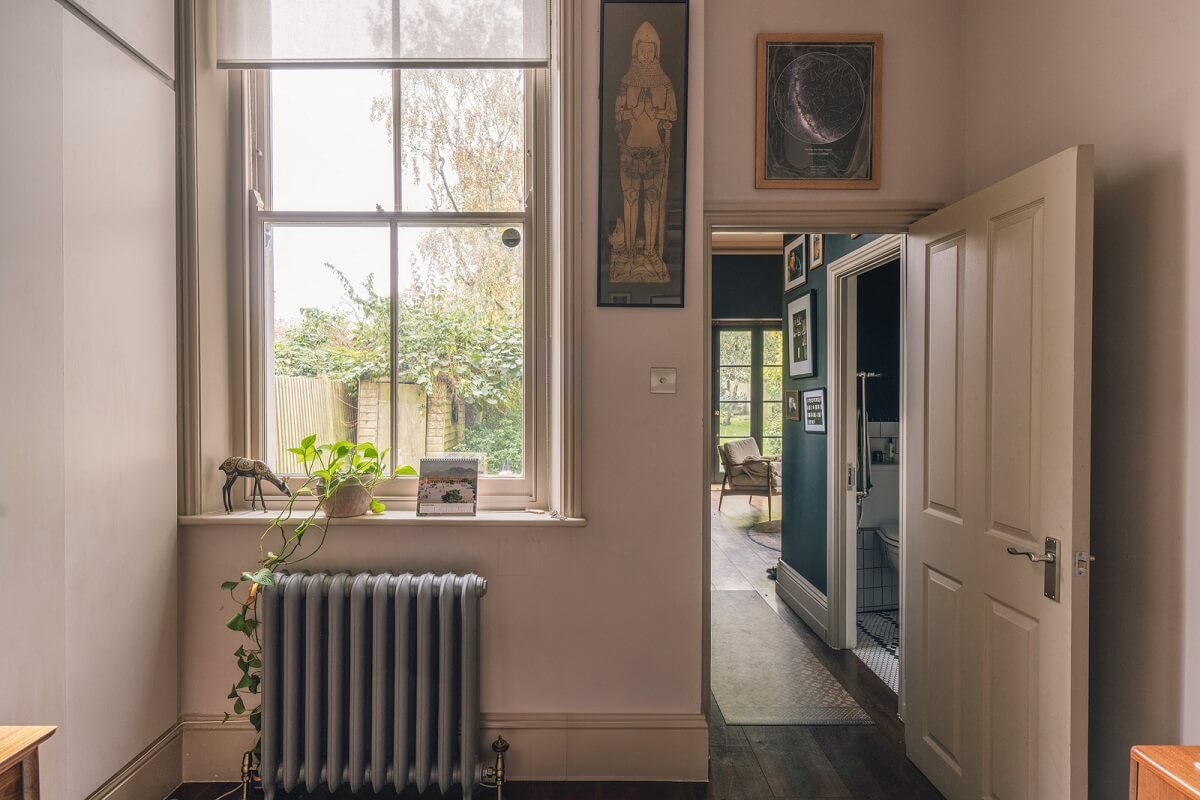 A Grand Ground Floor Apartment with Dark Blue Walls and a Garden 16 home office gray painted radiator
