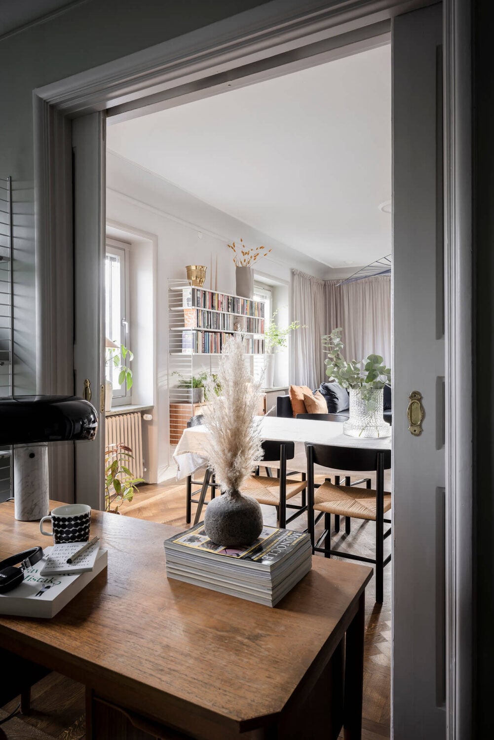 A Burgundy Kitchen in a Stylish Scandinavian Apartment 10 home office with views of living room