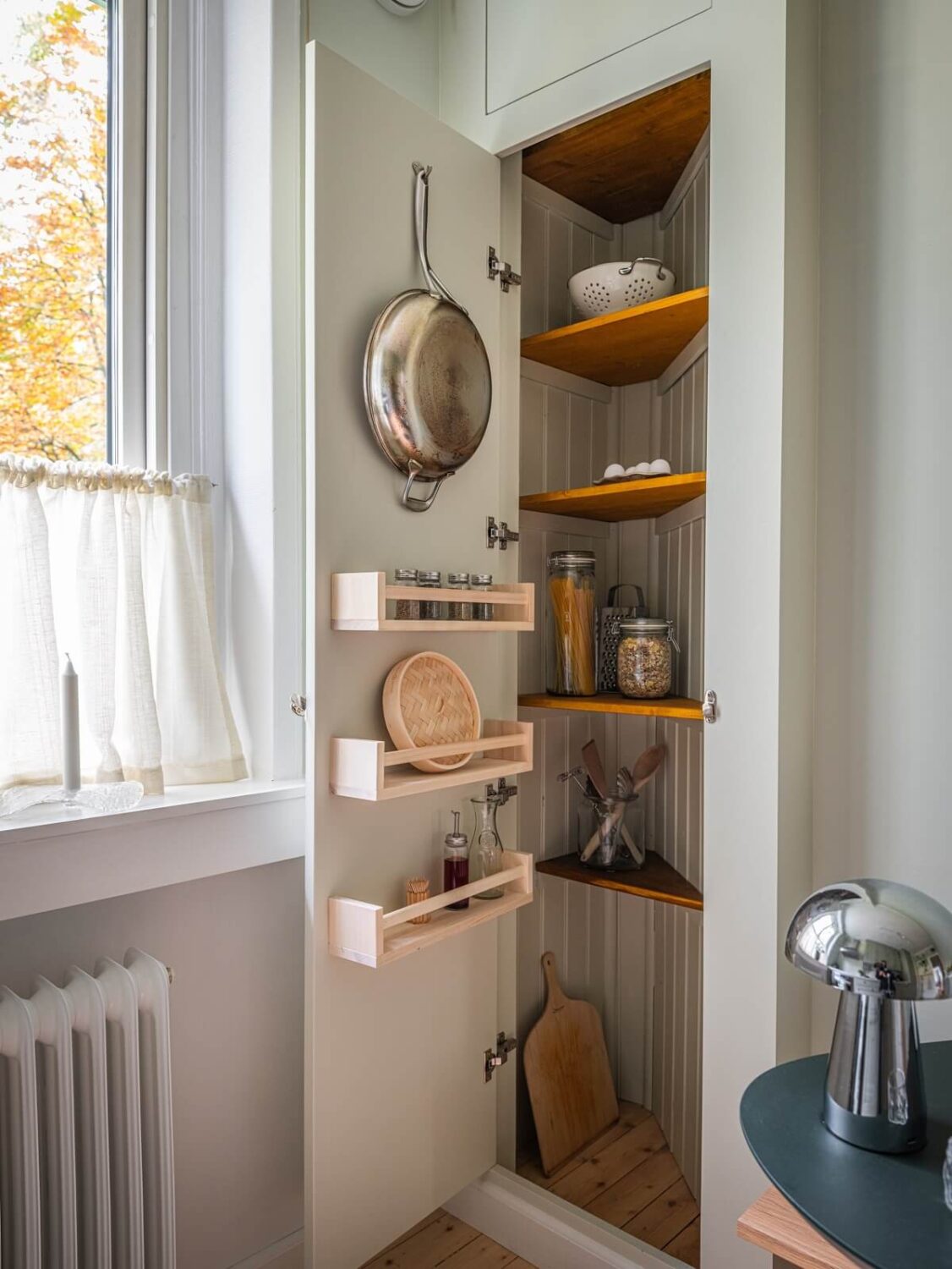 A 1930s Apartment with Gray Rooms and Period Features 11 kitchen built in pantry