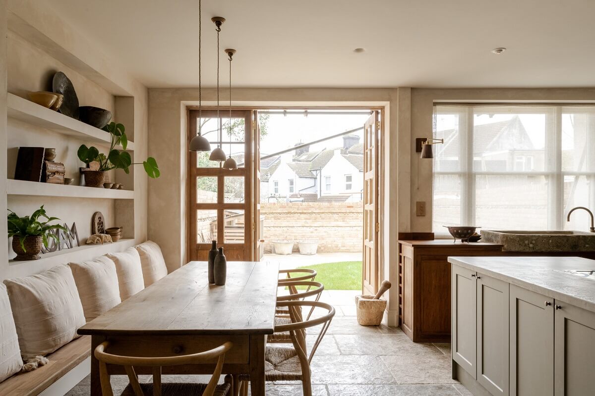 Serene Spaces with Limewash Walls in an English Victorian Home 3 kitchen dining space with rustic table