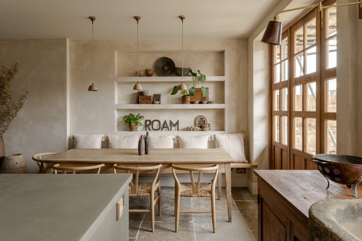 Serene Spaces with Limewash Walls in an English Victorian Home 2 kitchen dining table with built in shelves above