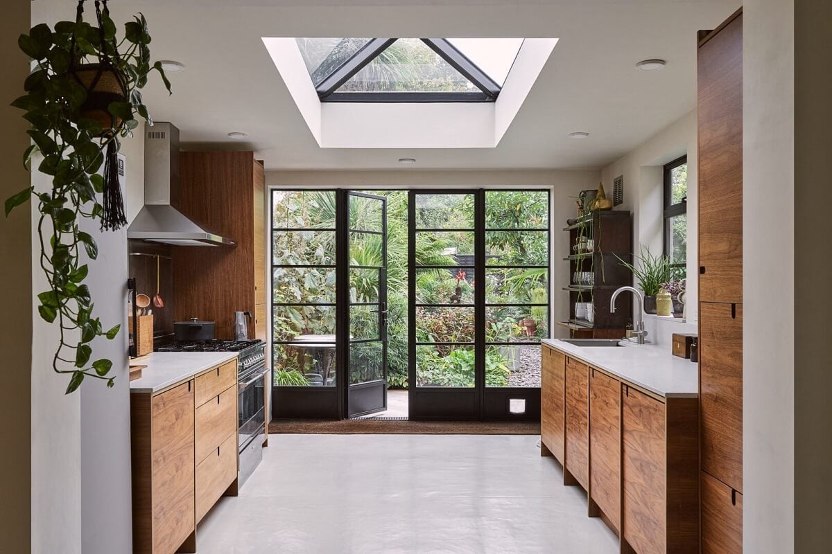 A Grand Victorian House with Many Period Features and a Lush Garden 5 kitchen extension with skylight wooden cabinets