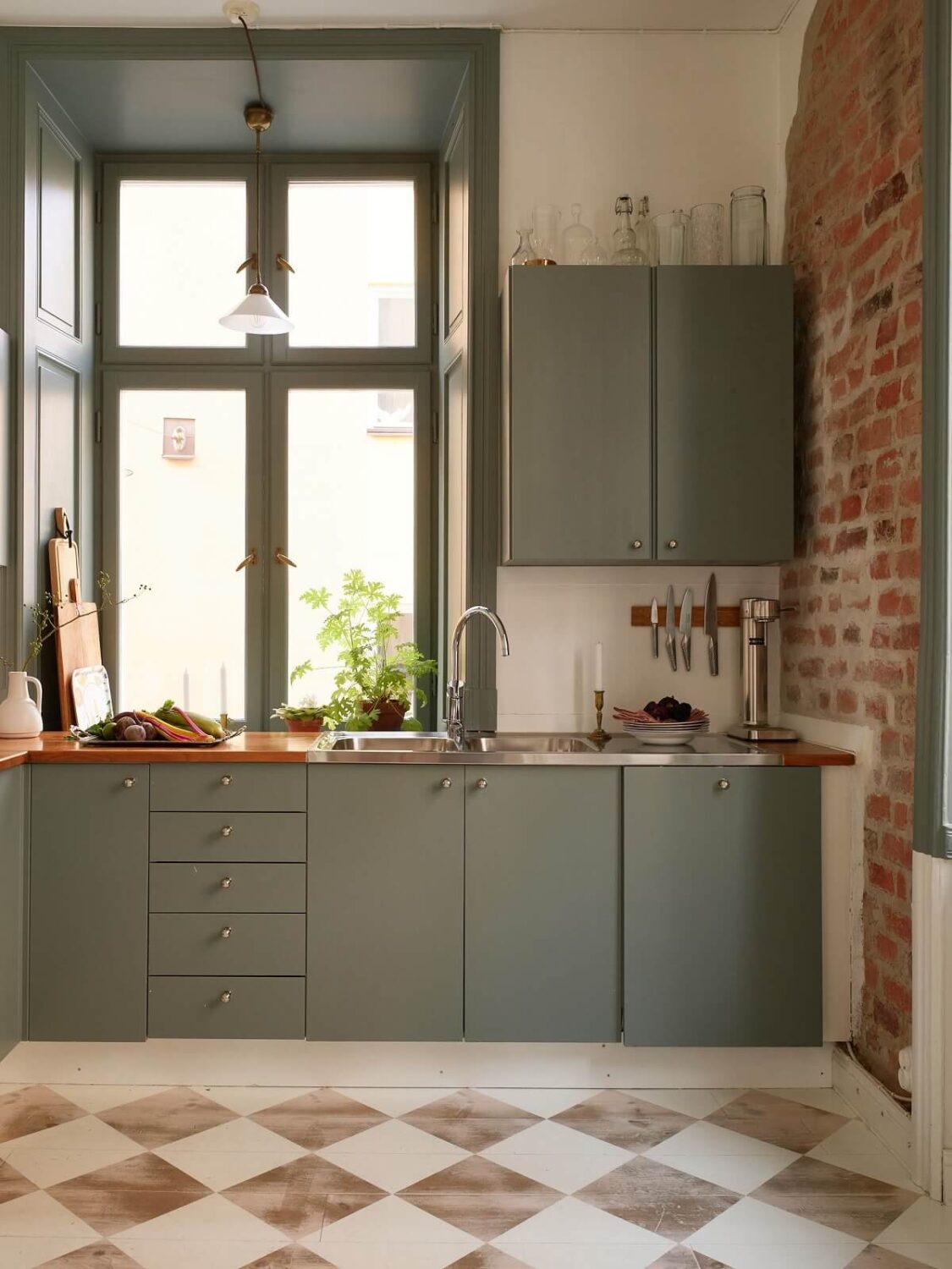 A Light Corner Apartment with 1890s Period Features 11 kitchen green cabinets checkerboard floor