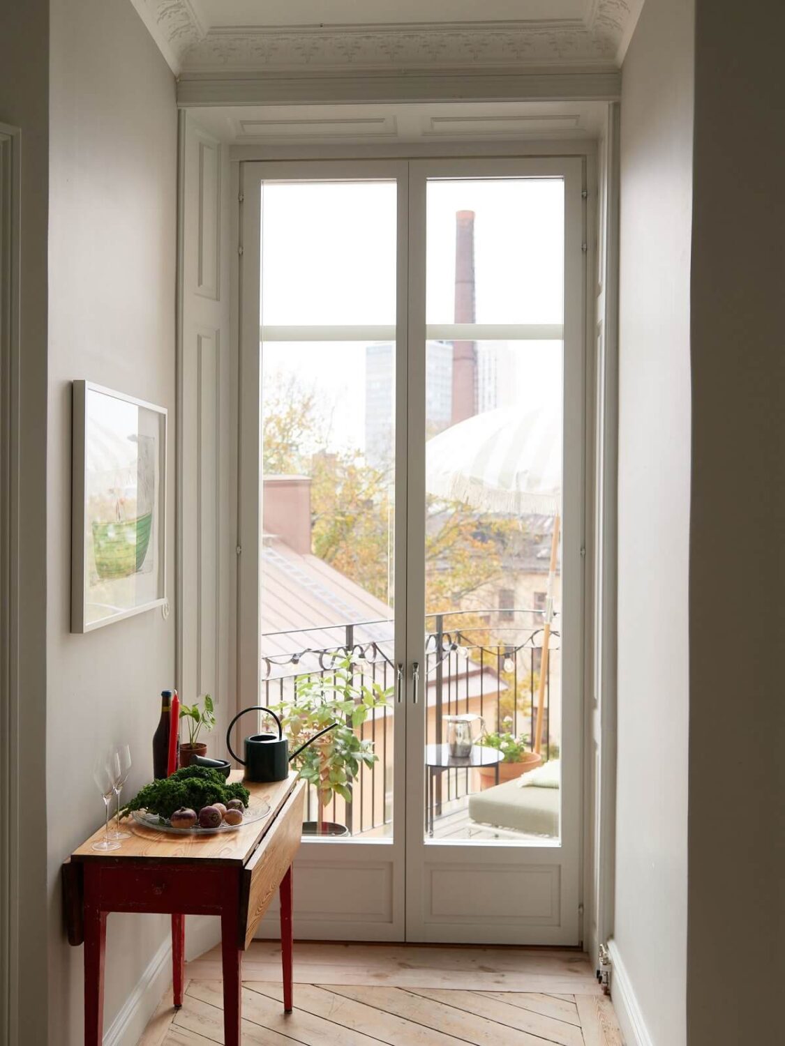 A Colorful Turn-of-the-Century Family Apartment in Stockholm 24 kitchen niche with balcony