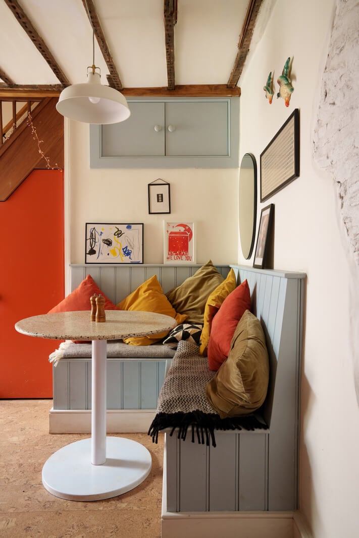 Colorful Furniture in a Historic English Cottage 5 kitchen table built in seating