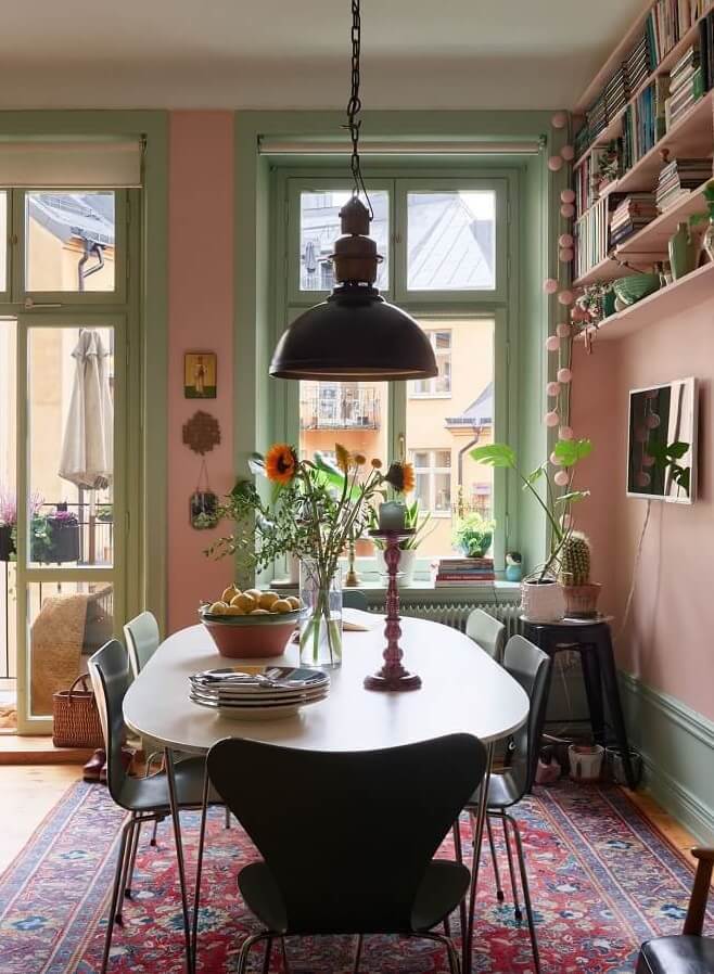 Best of 2024: Kitchens 3 kitchen table pink walls green joinery Best of 2024: Kitchens
