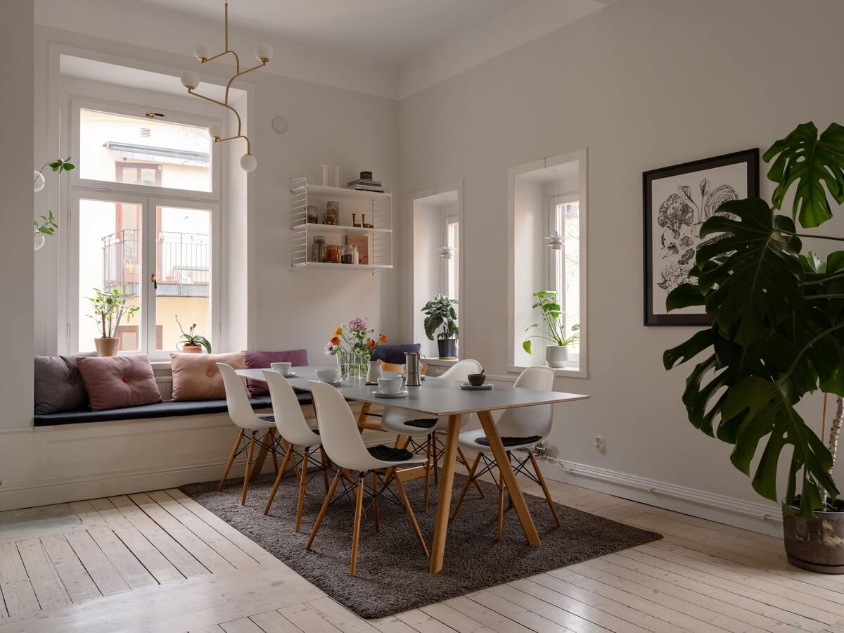 A Swedish Maisonette with Period Features and Modern Solutions 3 kitchen with dining table and window seat