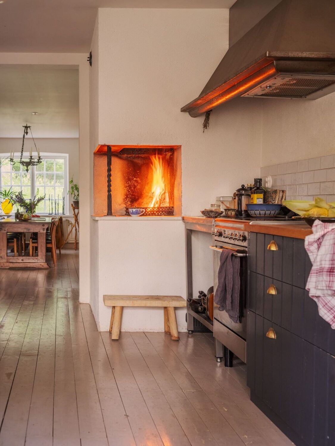 A Bohemian-Style House on the Estate of a Swedish Castle 8 kitchen with fireplace