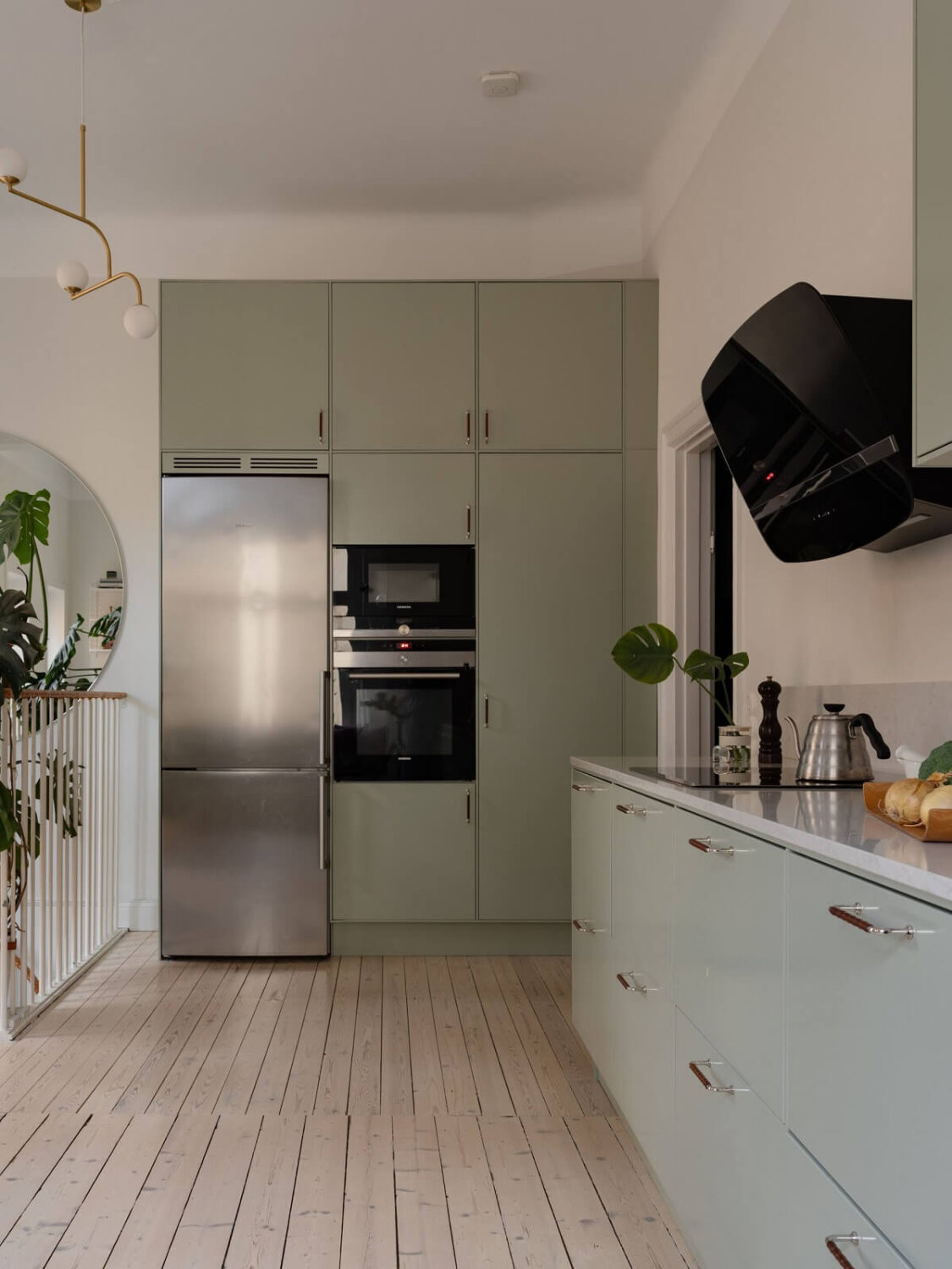 A Swedish Maisonette with Period Features and Modern Solutions 6 kitchen with floor to ceiling cabinets