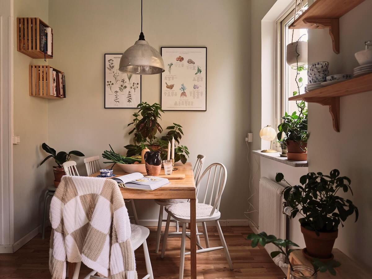 A Small Swedish Apartment with a Social and Semi-Open Floorplan 17 kitchen with large dining table