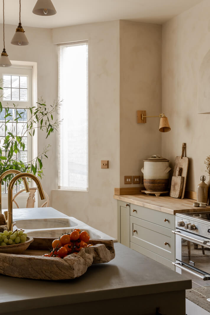 Limewash Walls and Restored Period Features in a Calm English Home 5 kitchen with limewash walls brass fittings
