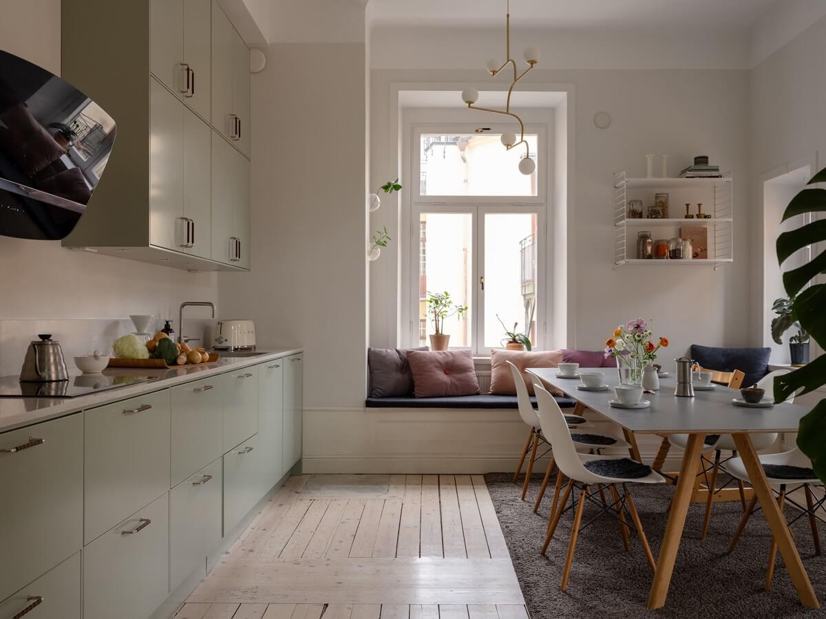 A Swedish Maisonette with Period Features and Modern Solutions 2 kitchen with wooden floor and window seat