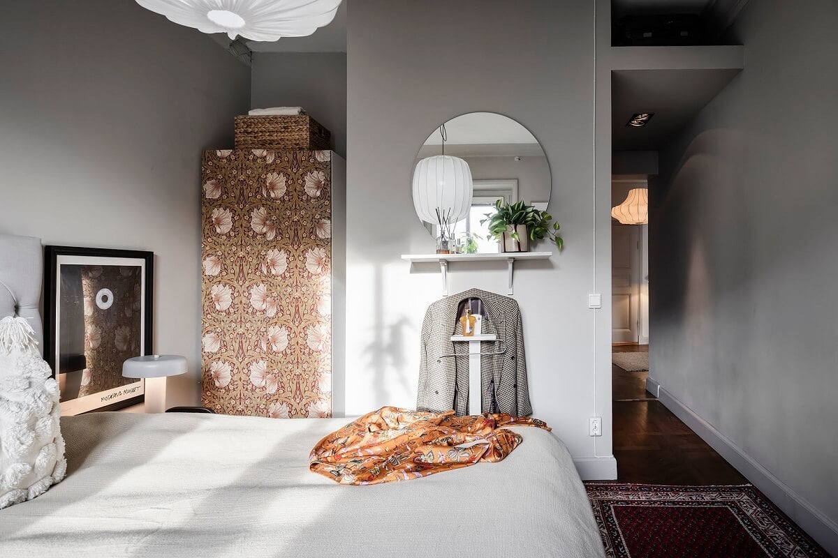 A Burgundy Kitchen in a Stylish Scandinavian Apartment 20 light gray bedroom with william morris wardrobe