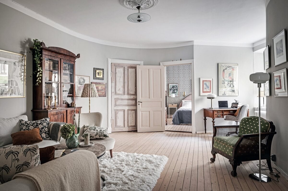A Stately Apartment with Period Details and Wallpapers 11 light gray living room with wooden floor and antique furniture