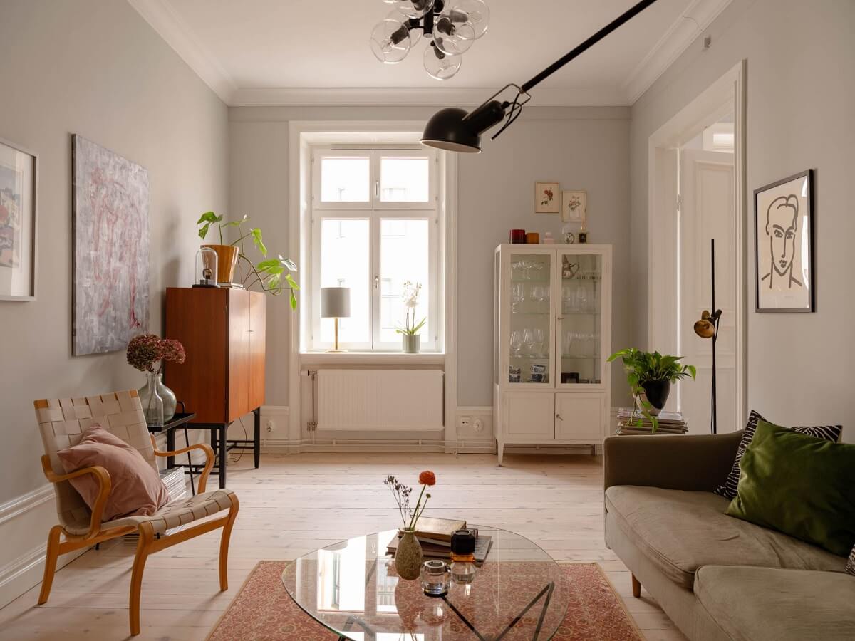A Spacious Stockholm Apartment with Light Gray Walls 1 light gray scandi living room