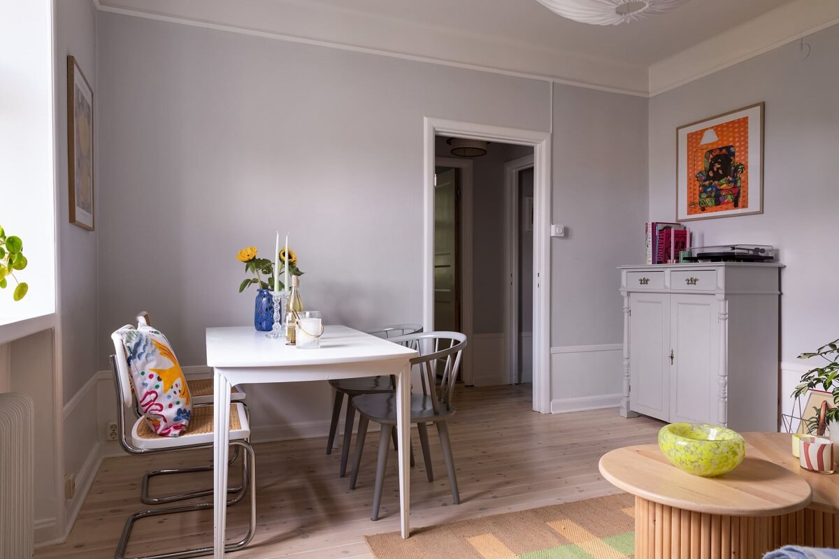 Soft Colors in a Charming Corner Apartment in Stockholm 5 light gray scandi living room