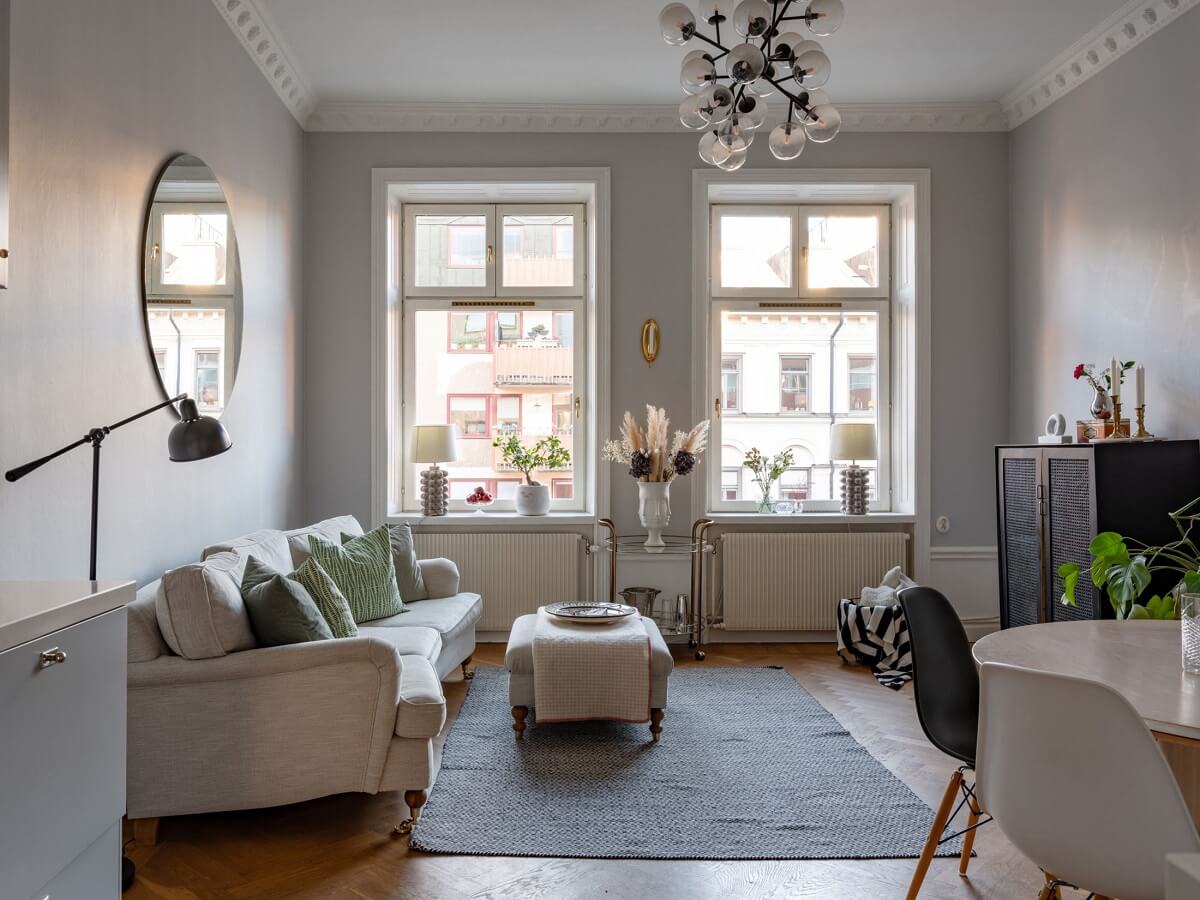 An 1890s Stockholm Apartment with a Blue Bedroom 3 light gray scandinavian living room