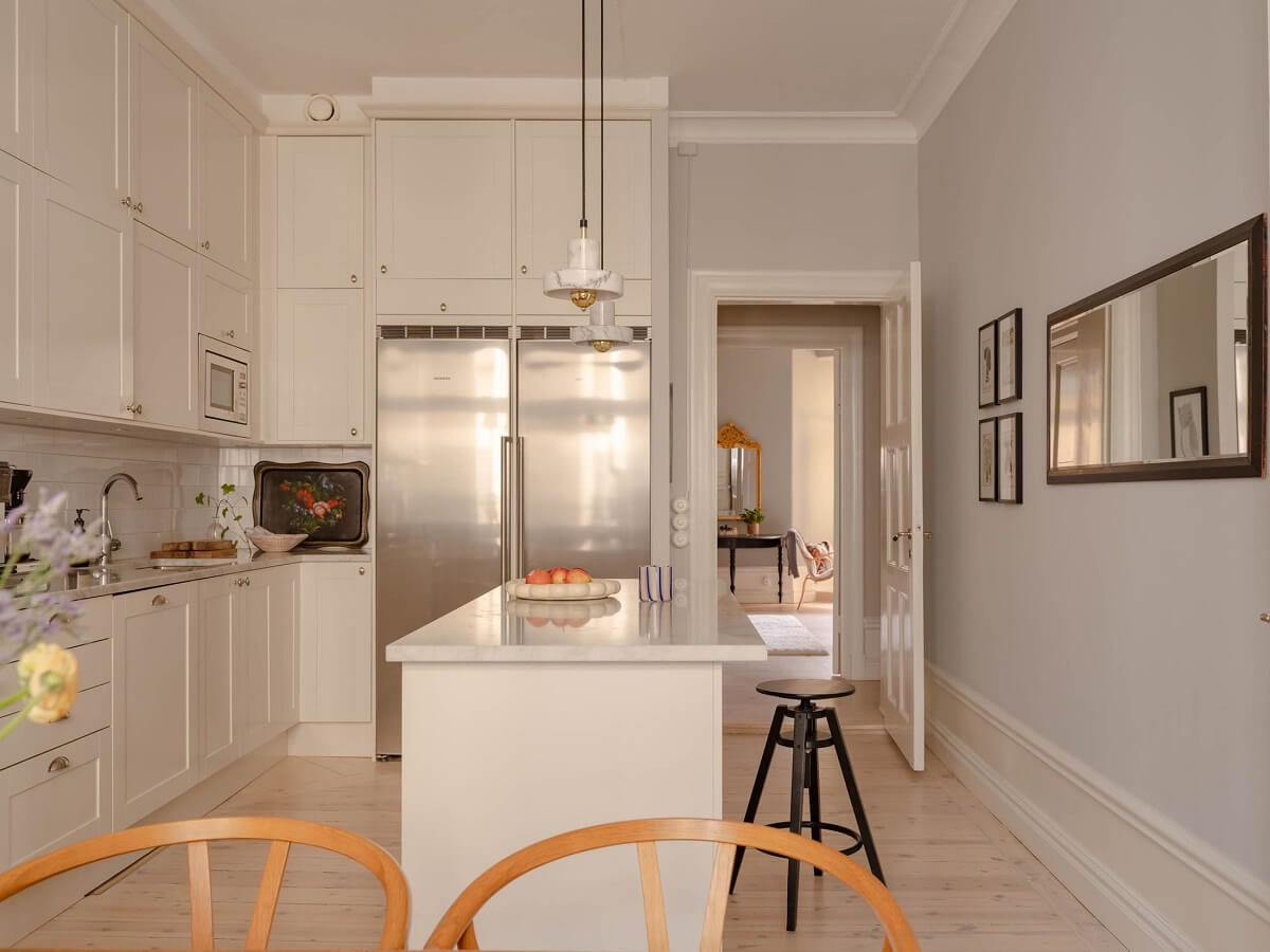 A Spacious Stockholm Apartment with Light Gray Walls 12 light scandi kitchen with island