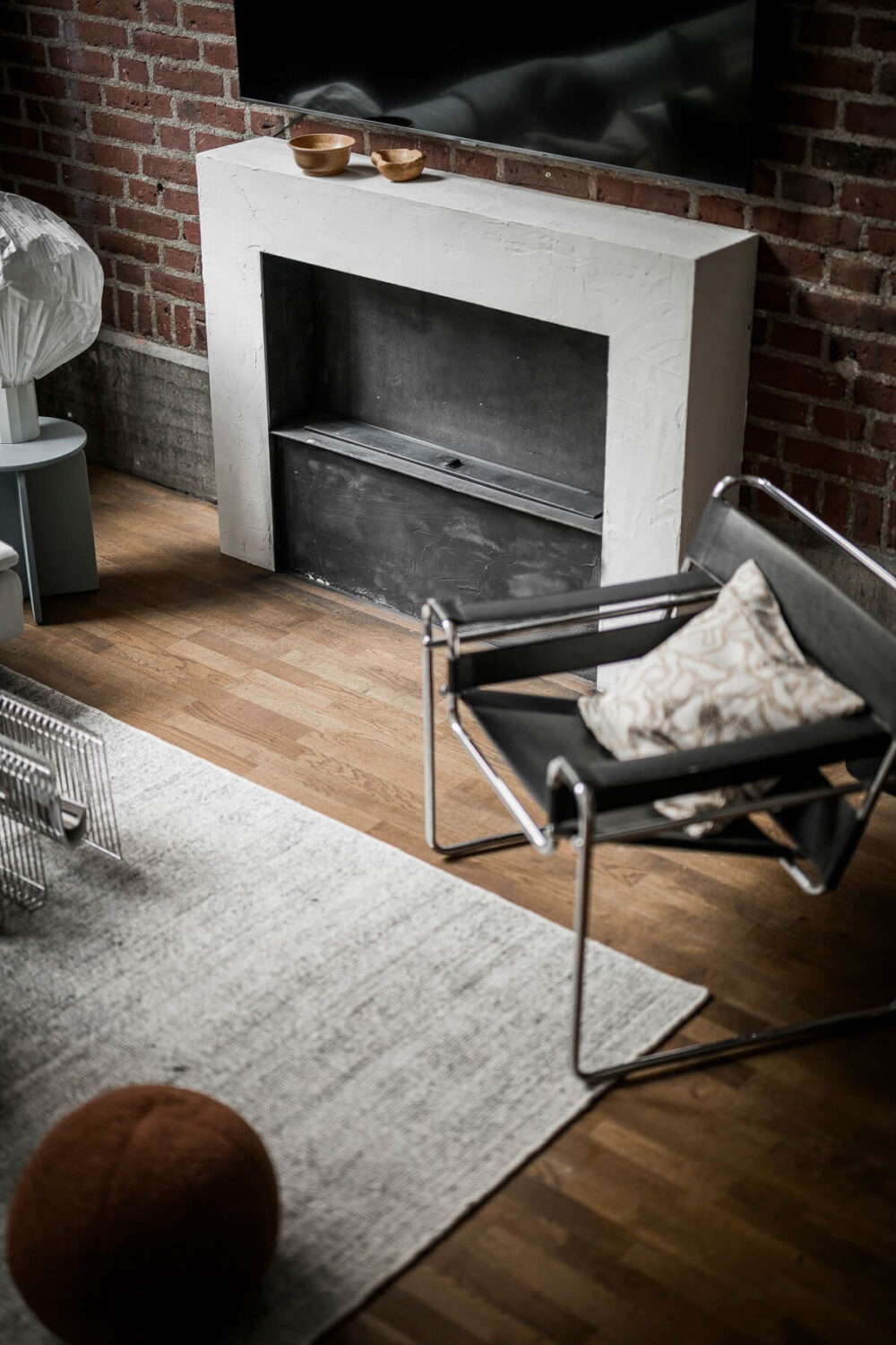 A Scandinavian Loft in an Old Industrial Building 5 living room brick wall
