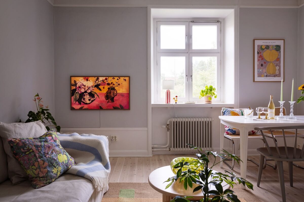 Soft Colors in a Charming Corner Apartment in Stockholm 2 living room light gray walls