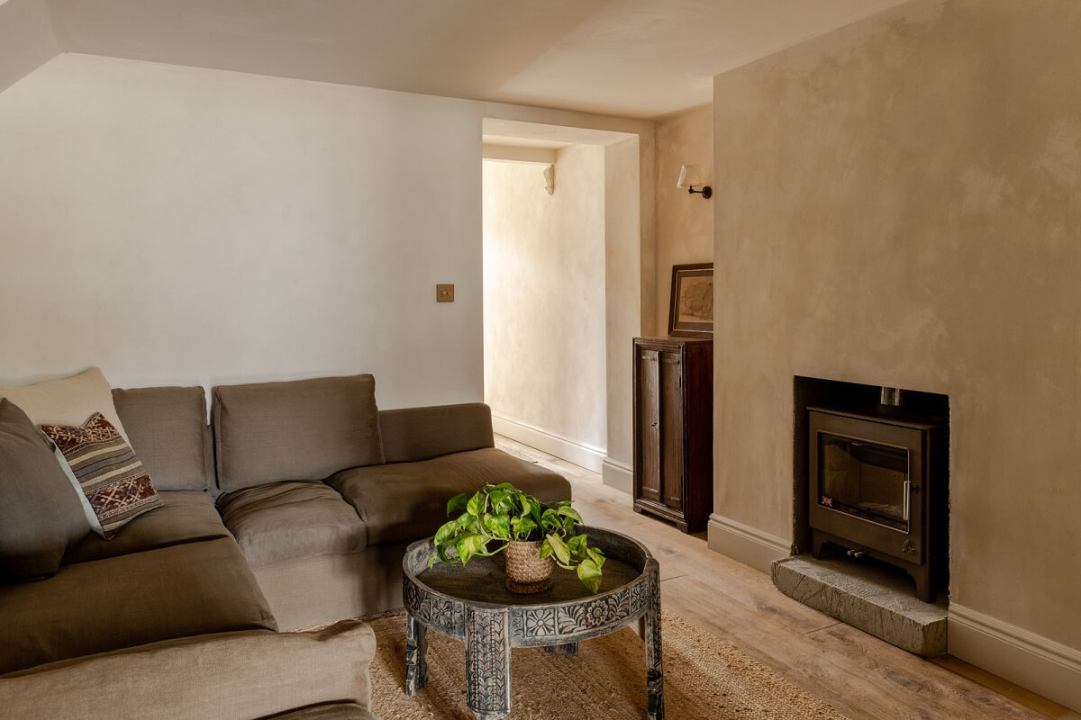 Serene Spaces with Limewash Walls in an English Victorian Home 9 living room limewash walls fireplace