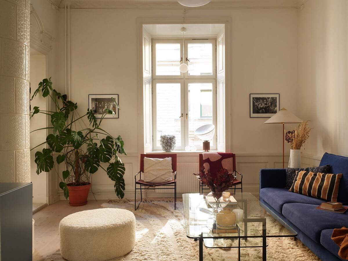 A Light Corner Apartment with 1890s Period Features 14 living room with blue sofa