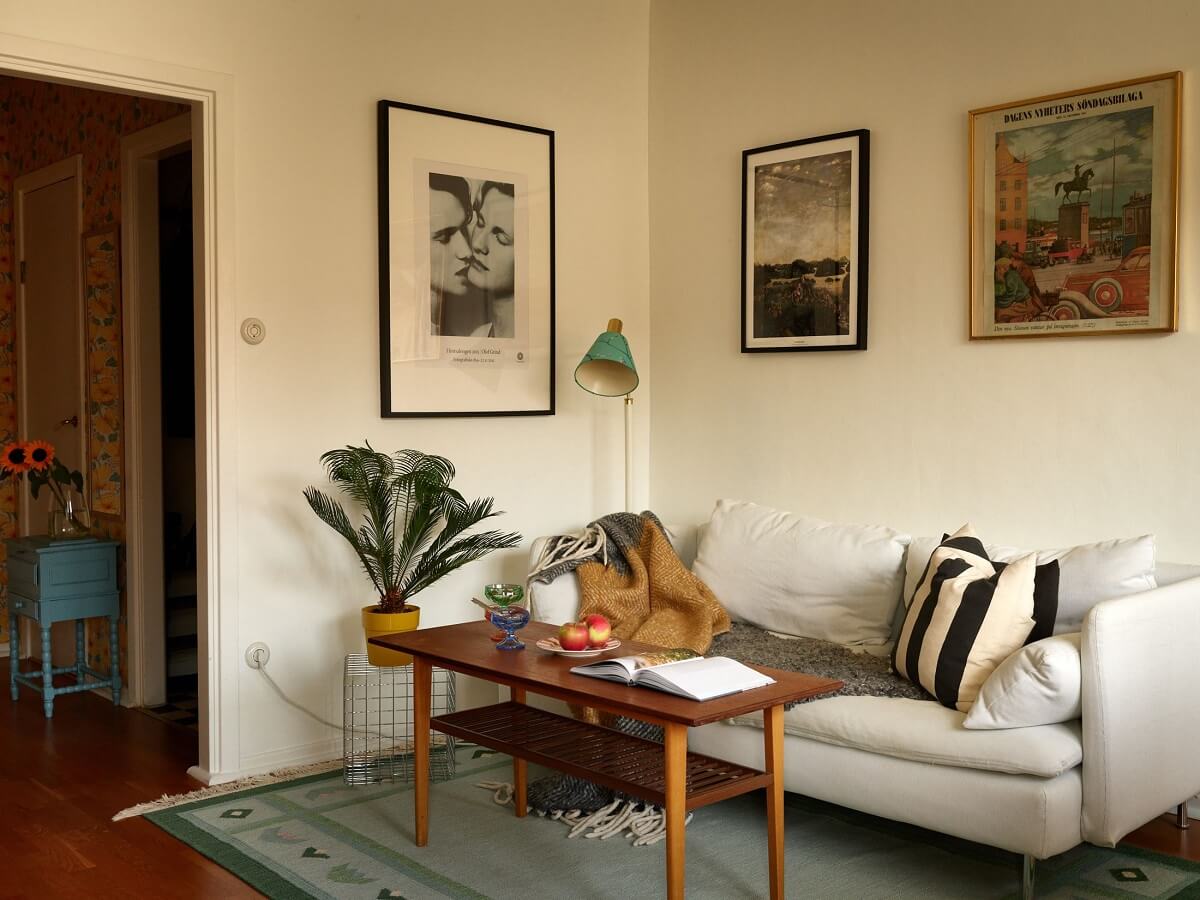 A Small 1930s Swedish Apartment with a Yellow Floral Hall 2 living room with green rug