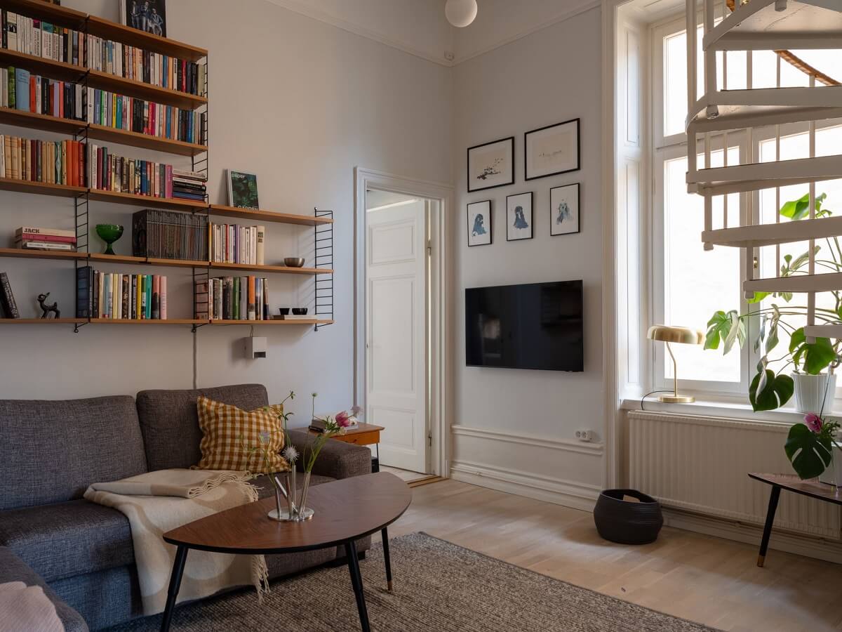 A Swedish Maisonette with Period Features and Modern Solutions 8 living room with shelves