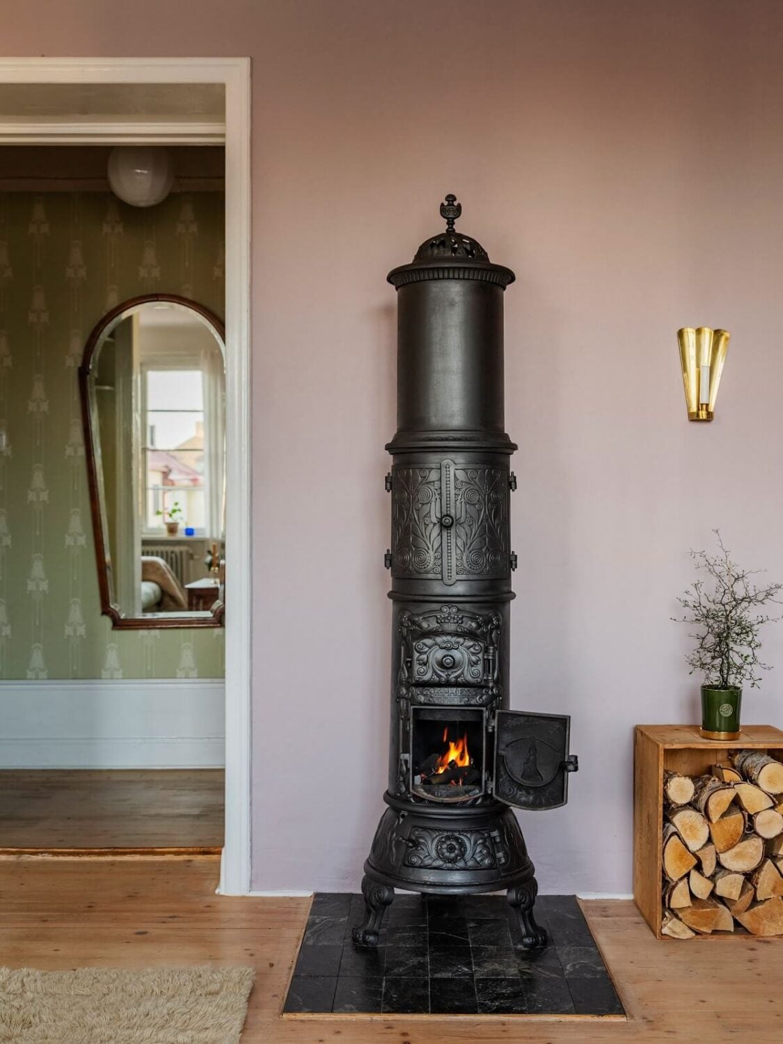 A Living Room with Light Purple Walls in a Swedish Apartment 4 living room woodburner