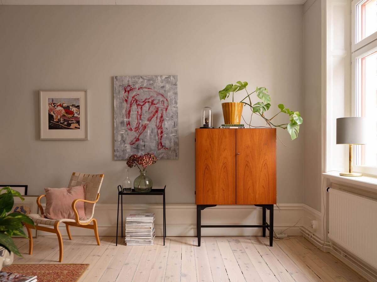 A Spacious Stockholm Apartment with Light Gray Walls 5 living room wooden floor
