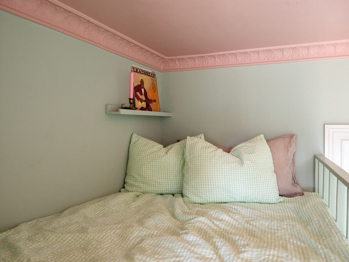 A Colorful Turn-of-the-Century Family Apartment in Stockholm 34 loft bed pink ceiling