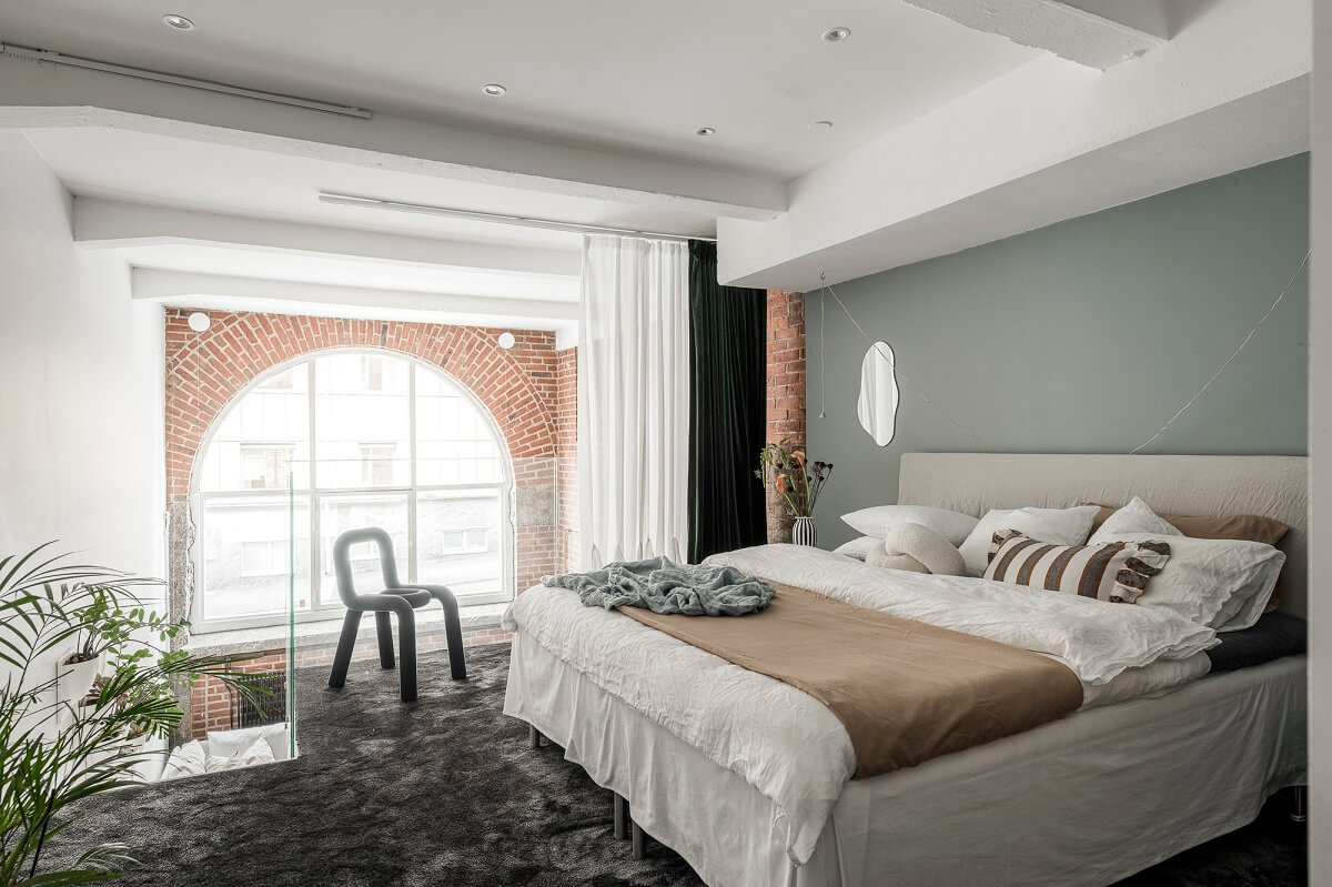 A Scandinavian Loft in an Old Industrial Building 16 loft bedroom black carpet