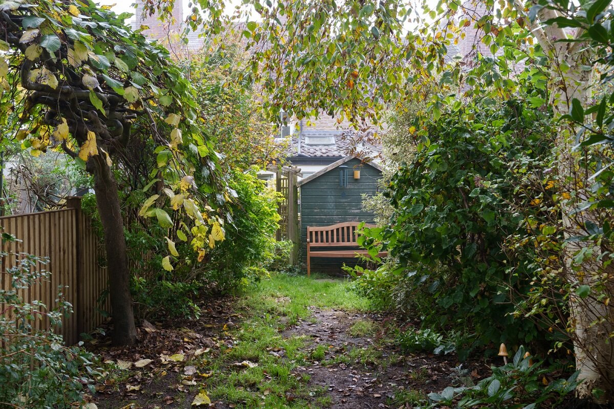 Colorful Furniture in a Historic English Cottage 22 long cozy green garden