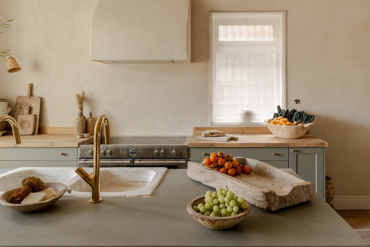 Limewash Walls and Restored Period Features in a Calm English Home 8 minimalistic kitchen with island