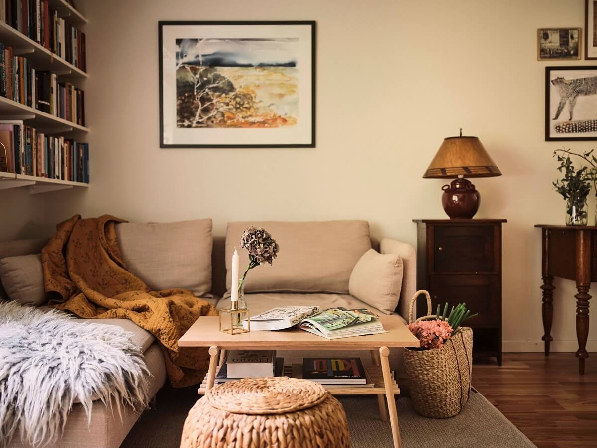 A Small Swedish Apartment with a Social and Semi-Open Floorplan 3 neutral living room bookshelves