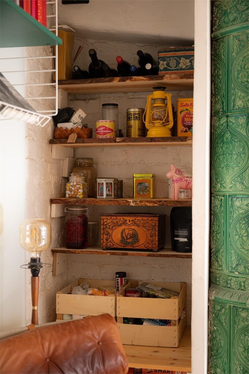 Green Tones in a Turn-of-the-Century Stockholm Apartment 11 niche with storage shelves